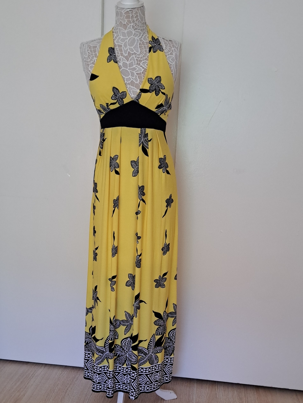 Rhapsody Yellow Halter Maxi Dress with Black Waistband and Floral Print